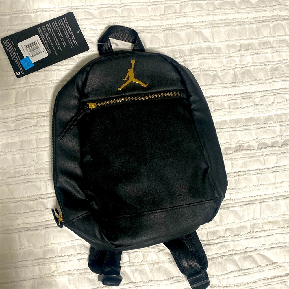 Brand new small Jordan faux Leather backpack